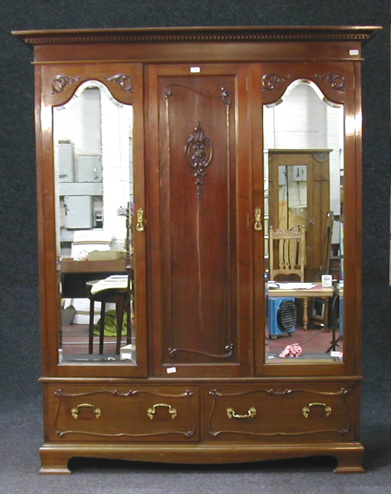 A rococo four piece bedroom suite