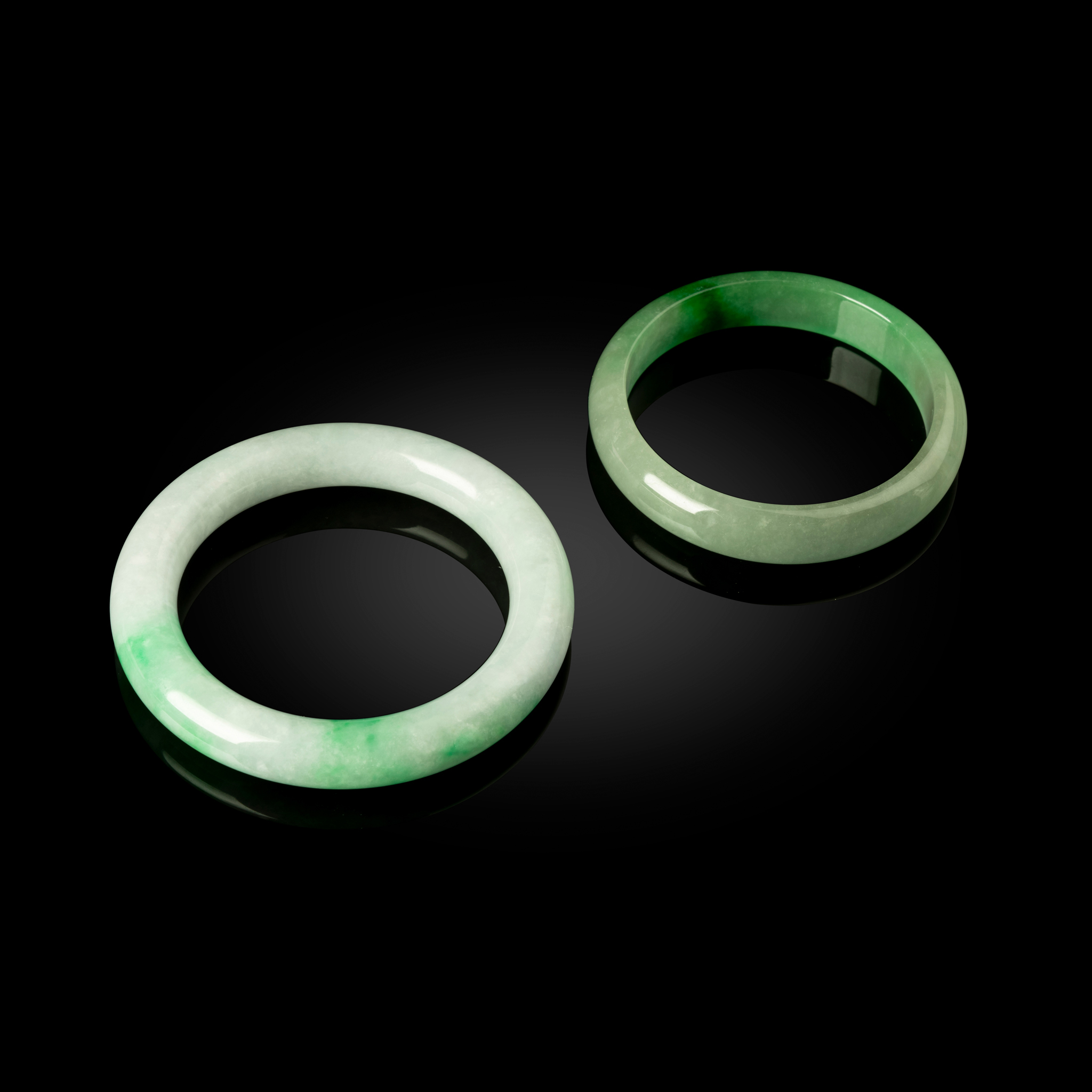 TWO CHINESE JADEITE BANGLES