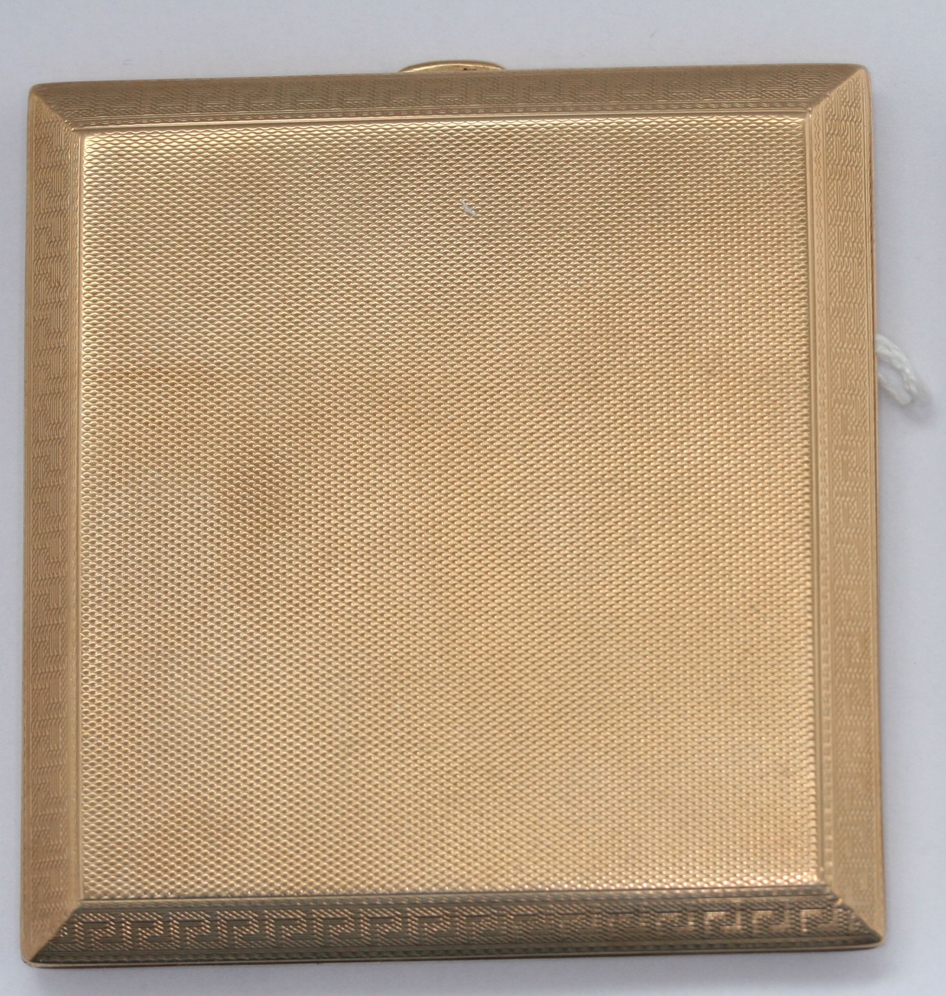 A 9ct gold cigarette case