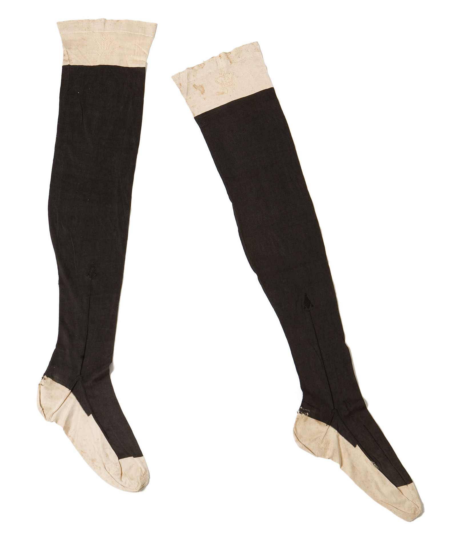 PAIR OF QUEEN VICTORIA'S WOOL AND LACEWORK IVORY TOPPED BLACK STOCKINGS