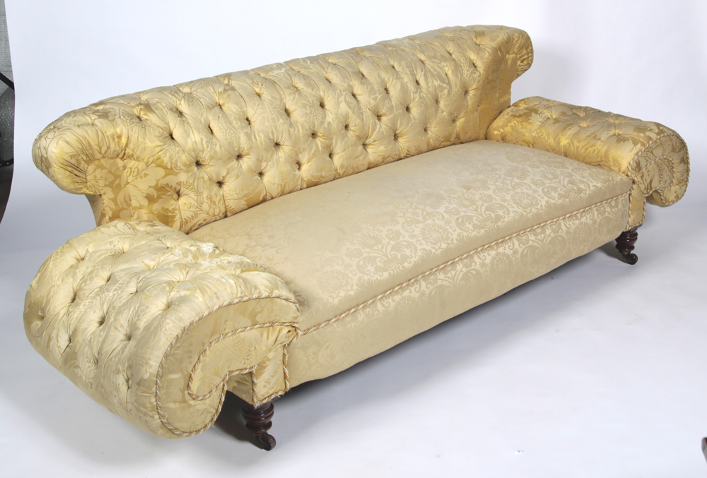 A late Victorian buttoned Chesterfield settee