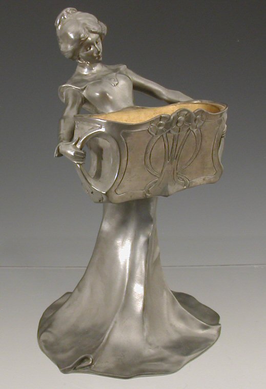 An Art Nouveau pewter centrepiece, signed Ase. Piquemal,