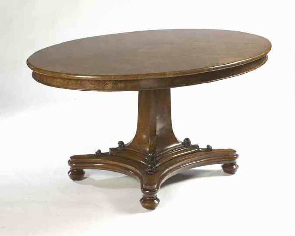 A mid Victorian period walnut and burr walnut oval breakfast table