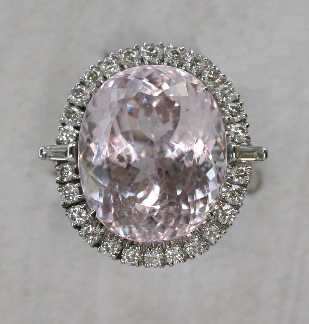 A modern Kunzite and diamond ring