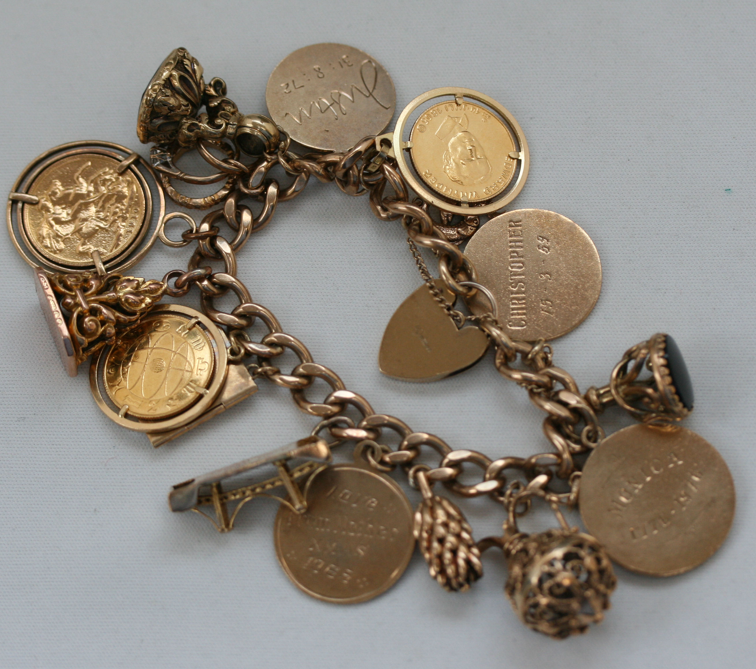 A 9ct gold charm bracelet