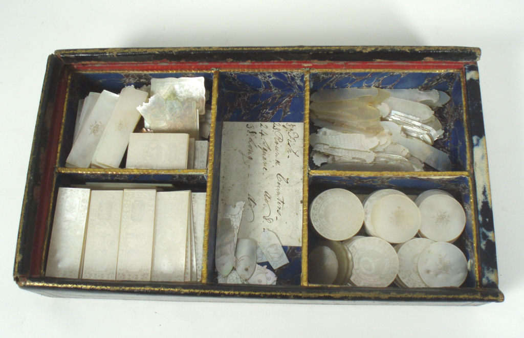 A collection of 19th century Chinese crested games counters