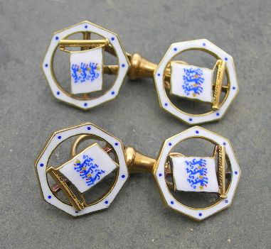 A pair of 15ct gold enamel decorated cufflinks