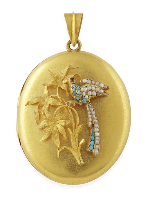 A Victorian oval gem set locket