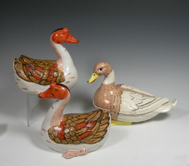 A pair of ceramic model ducks