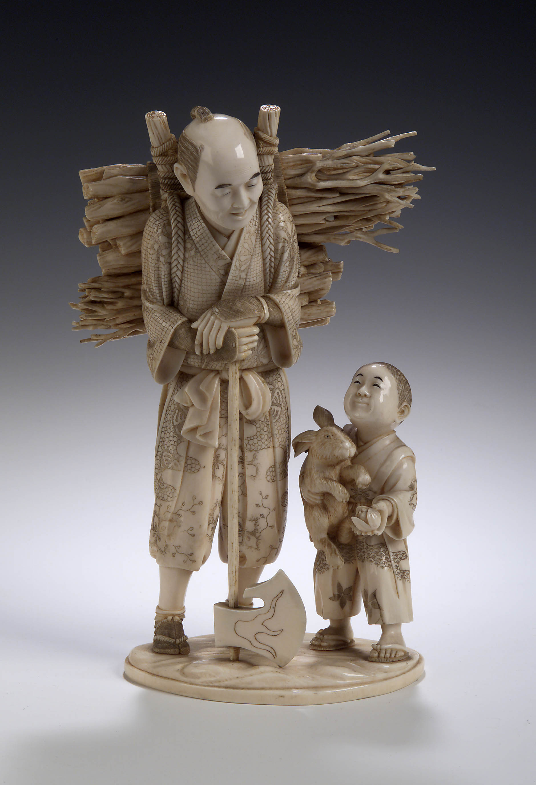 A Japanese carved ivory figure