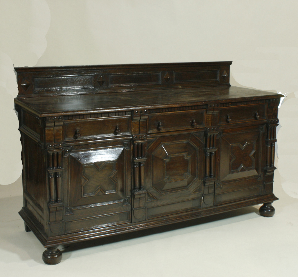 A Jacobean Revival oak side board