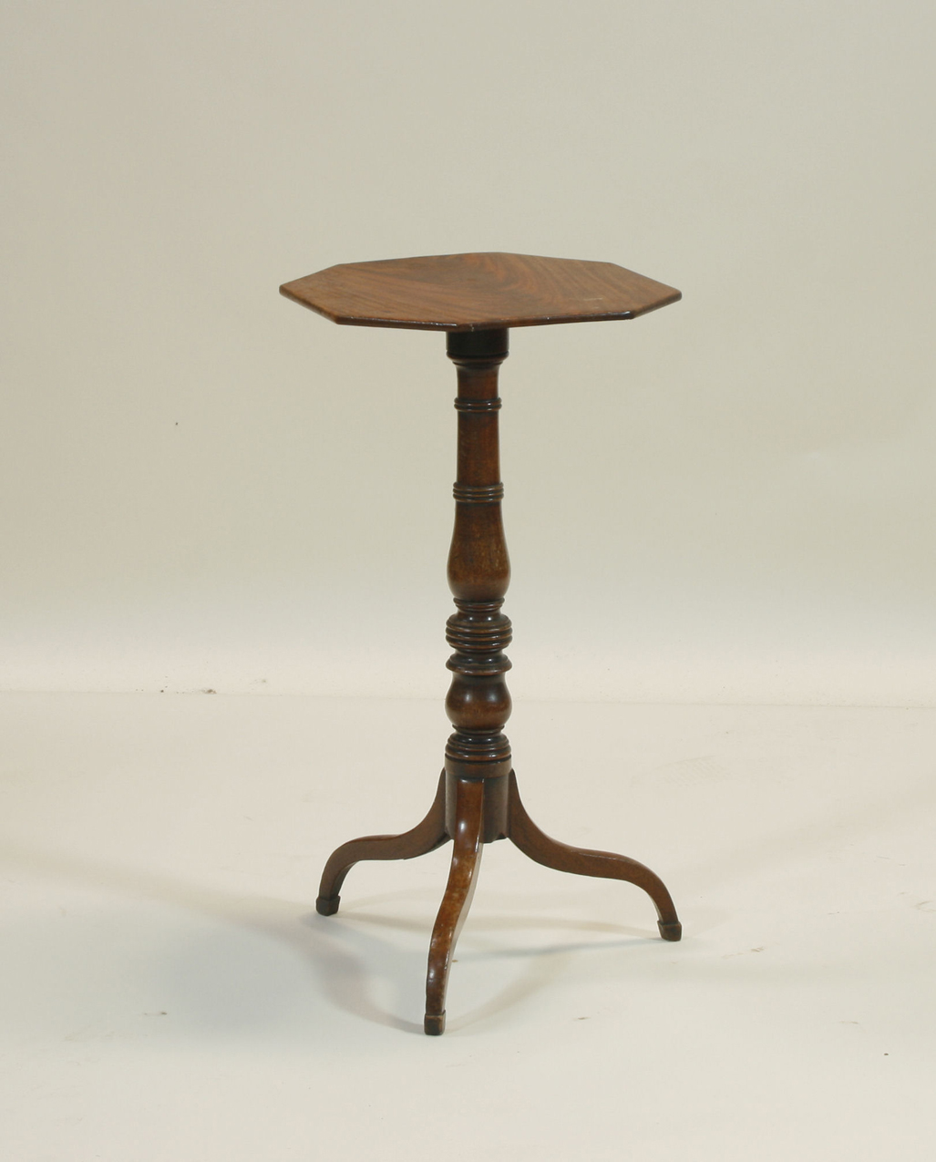 A George III mahogany octagonal tripod table