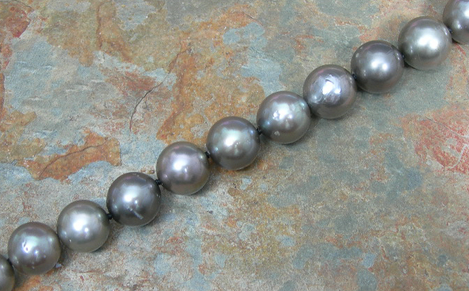 A cultured pearl necklace,