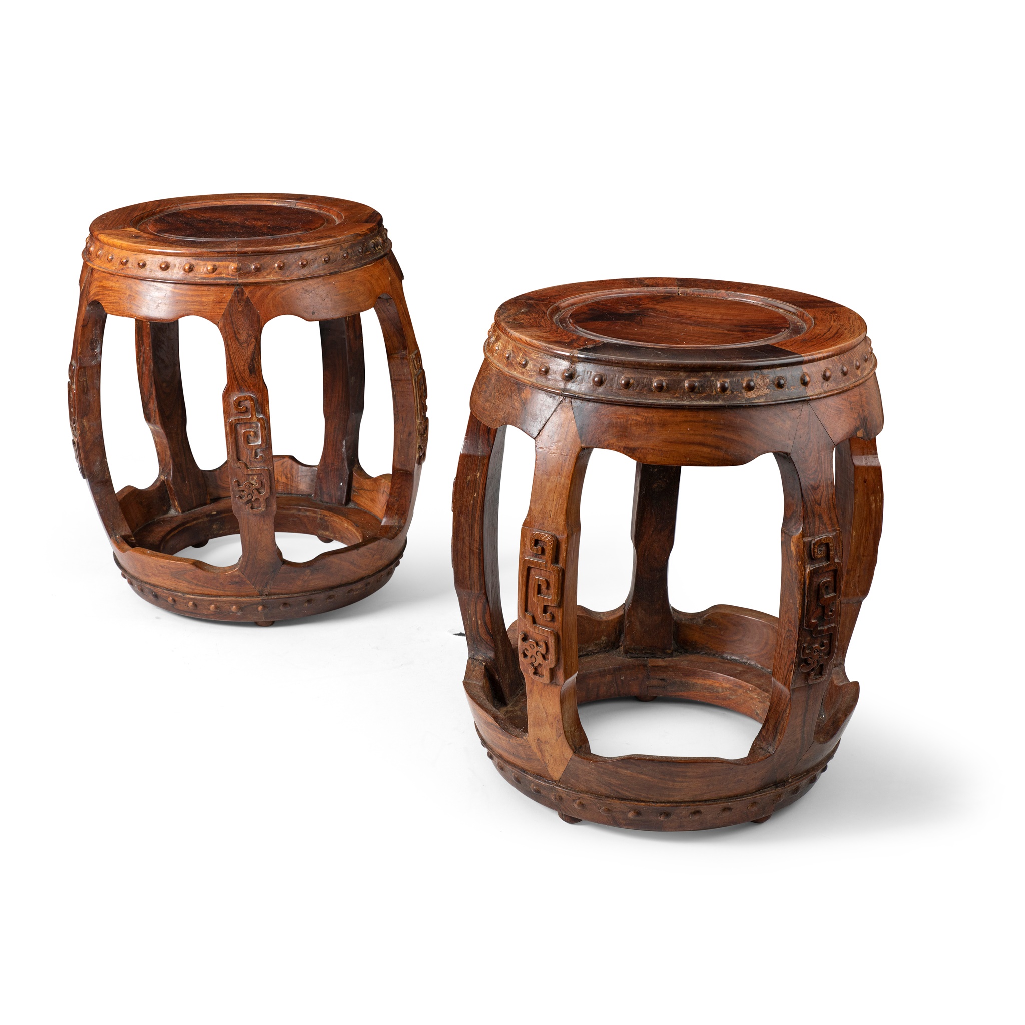 PAIR OF HUANGHUALI AND HARDWOOD CARVED DRUM FORM STOOLS