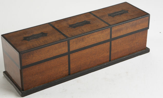 A George III period mahogany ebony and coromandel inlaid money box
