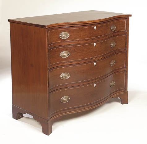 A Scottish George III mahogany serpentine commode,