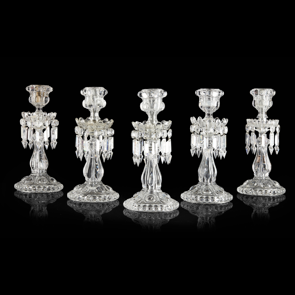 FIVE BACCARAT GLASS CANDLESTICKS