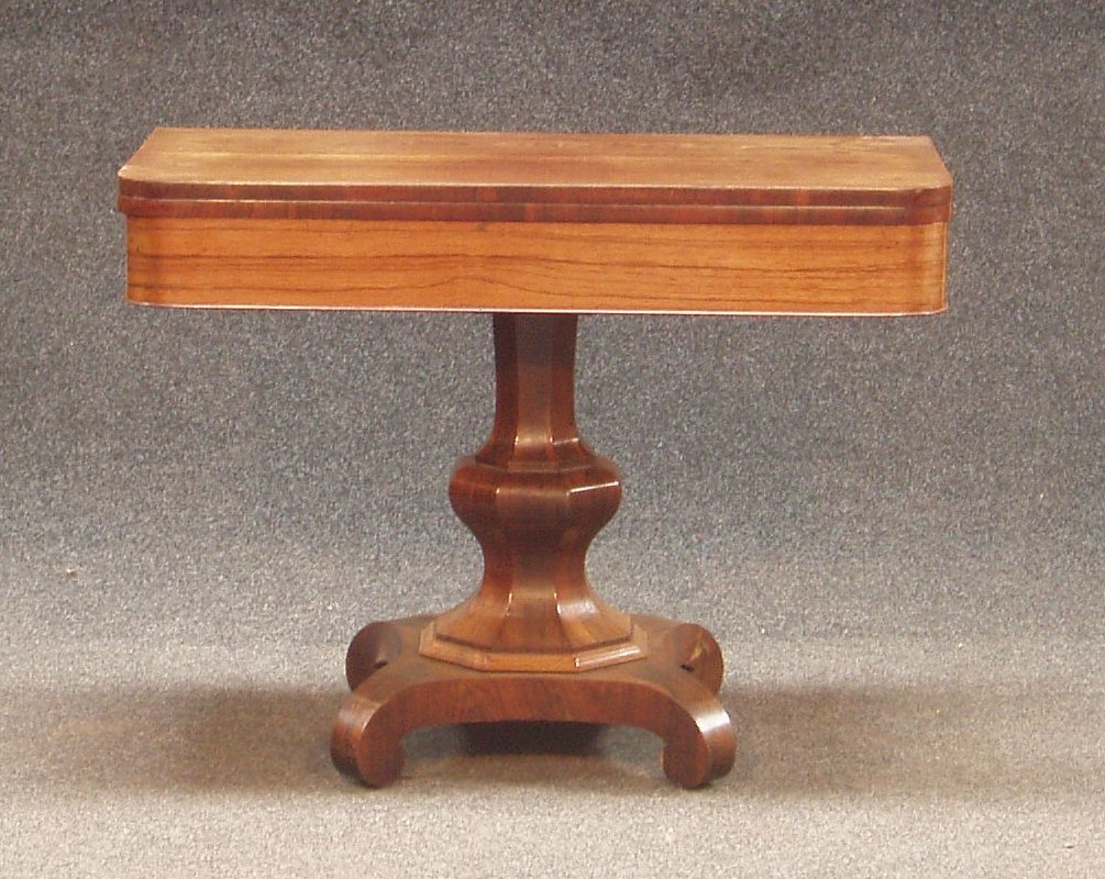 An early Victorian rosewood tea table,