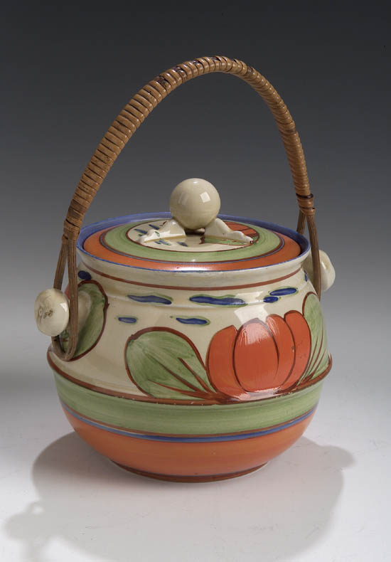 A Clarice Cliff ovoid biscuit barrel and cover