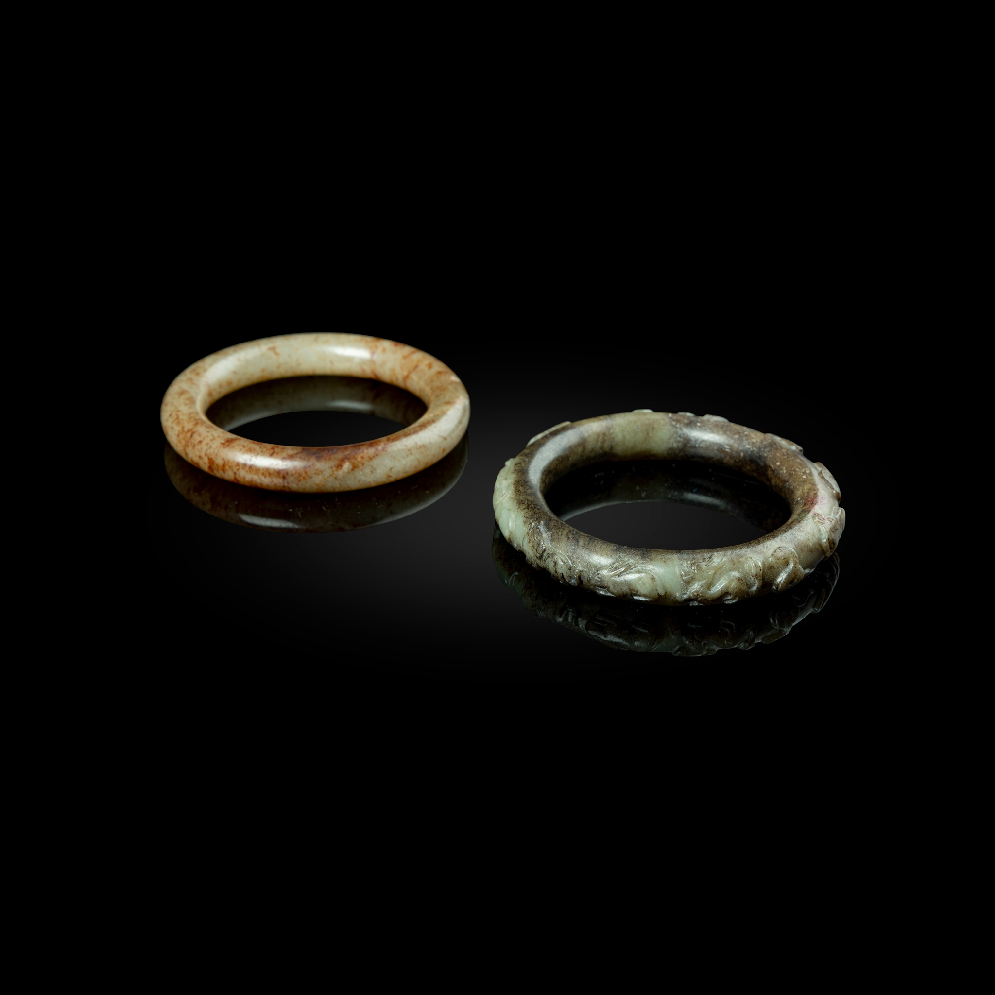 TWO CHINESE JADE BANGLES
