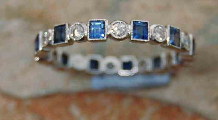 A sapphire and diamond full-eternity ring,
