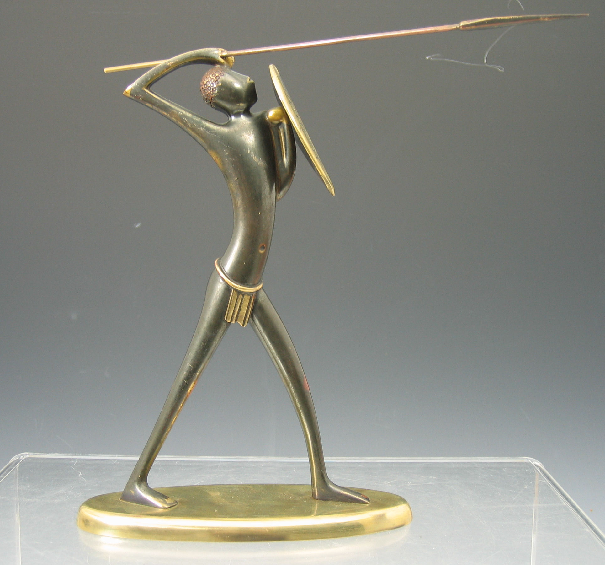 A Hagenauer patinated bronze figure,