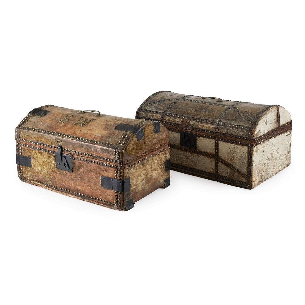 TWO LATE GEORGIAN DOME-TOP HIDE-COVERED TRUNKS
