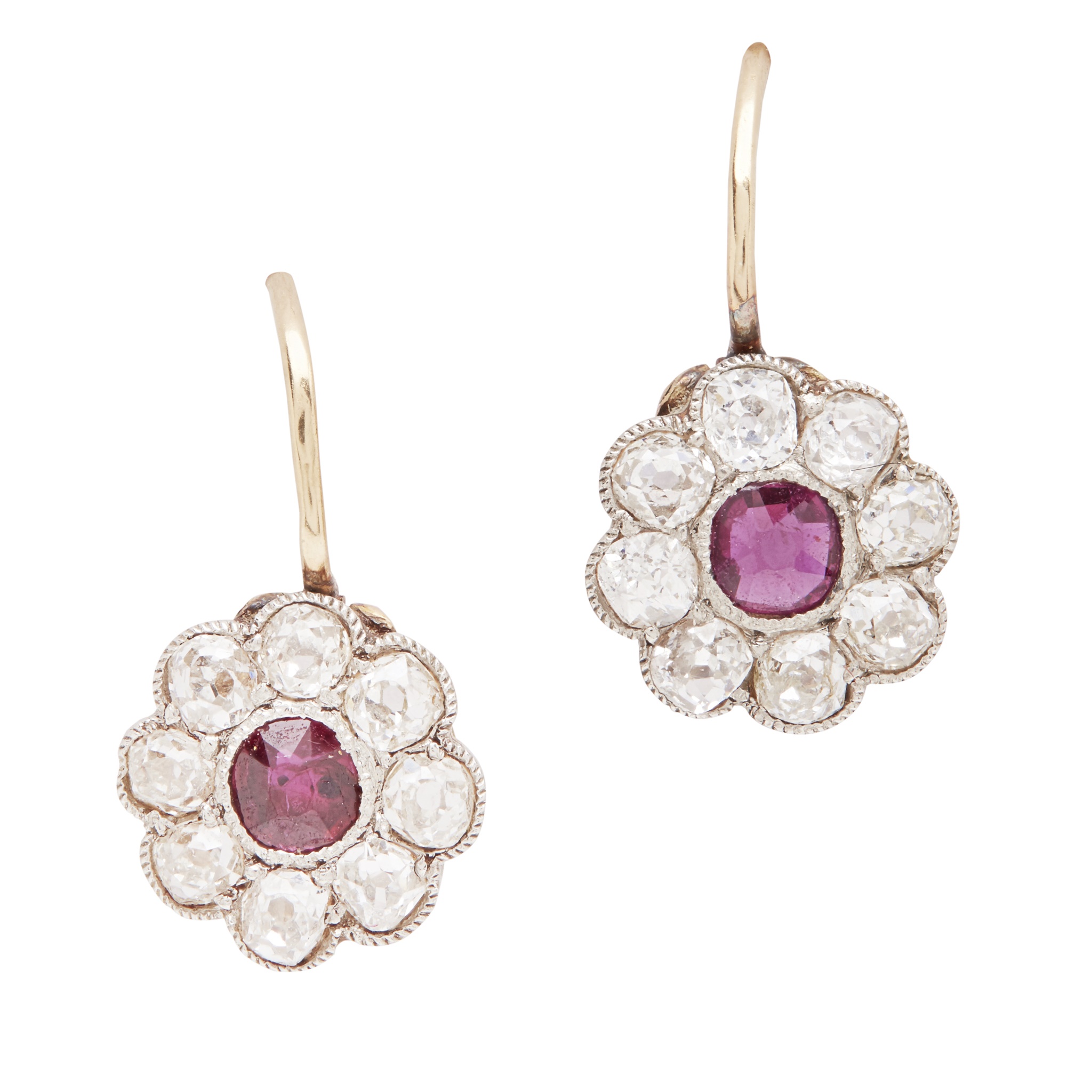 A pair of ruby and diamond set cluster earrings