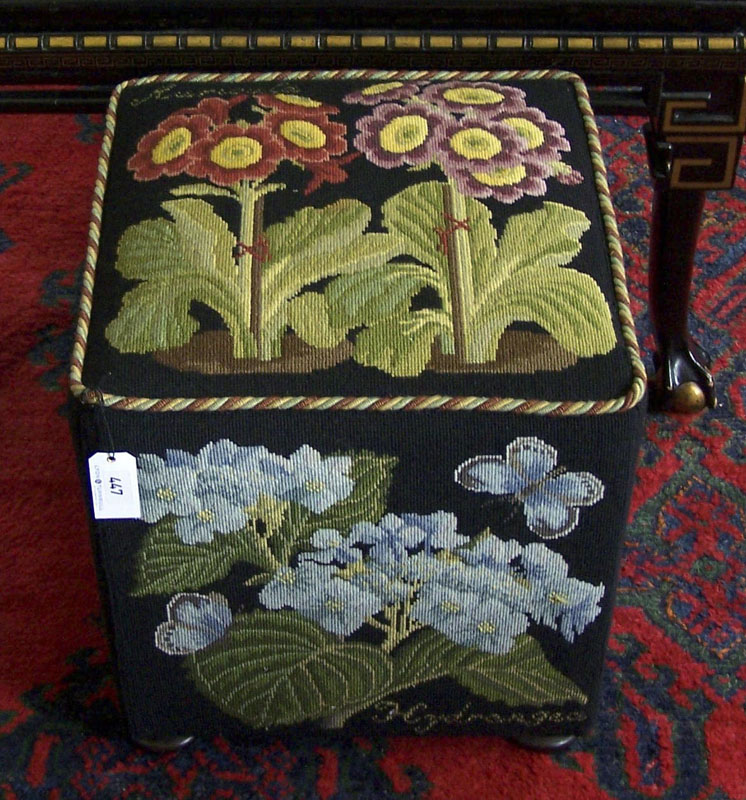 An upholstered pouffe