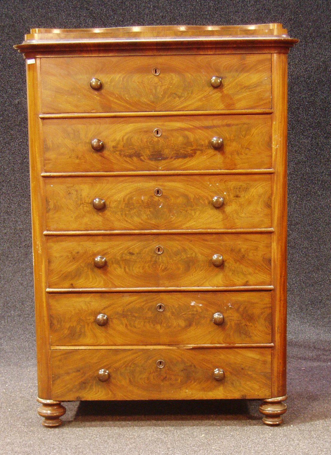A Victorian mahogany chest of six drawers,