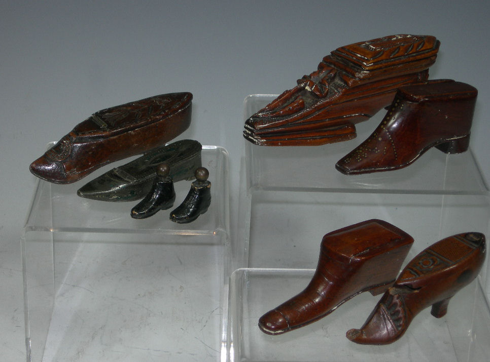 A group of treen shoe snuff boxes