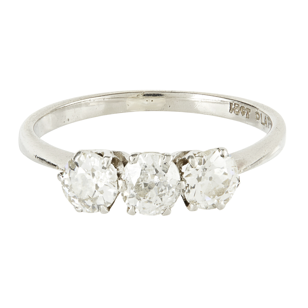 A three stone diamond set ring