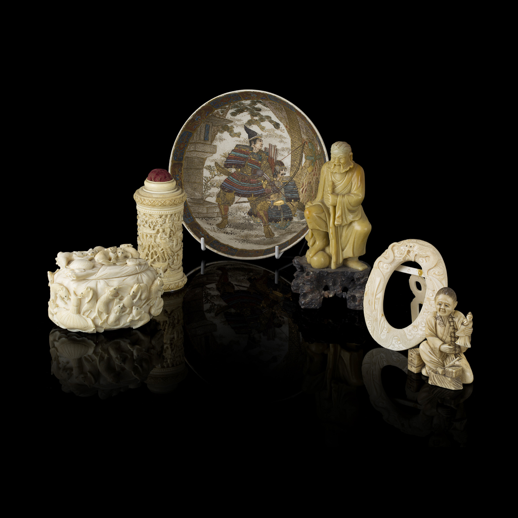 FOUR CHINESE AND JAPANESE IVORY CARVINGS