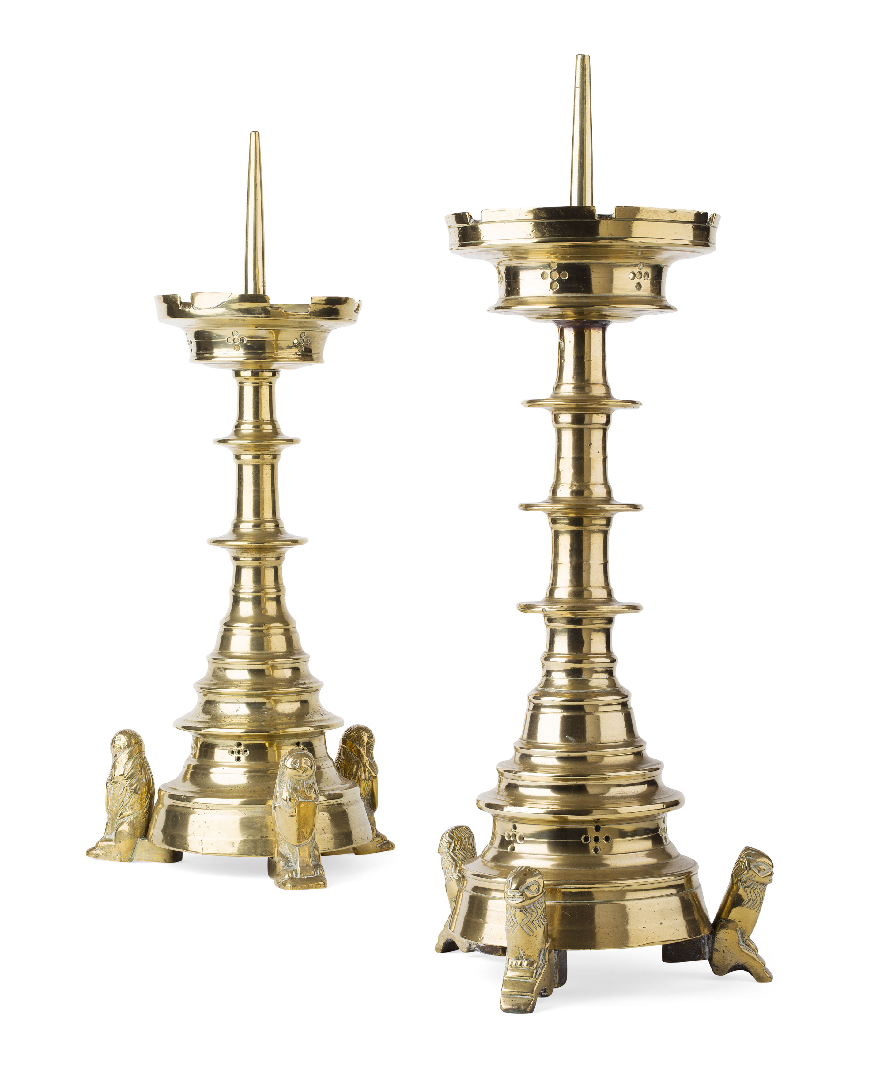 TWO SIMILAR DUTCH PRICKET BRASS CANDLESTICKS