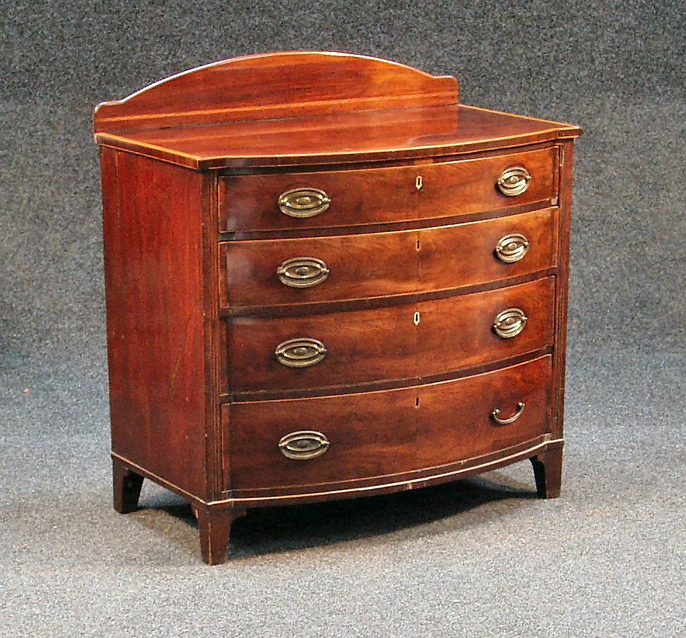 A Georgian mahogany bowfront chest,