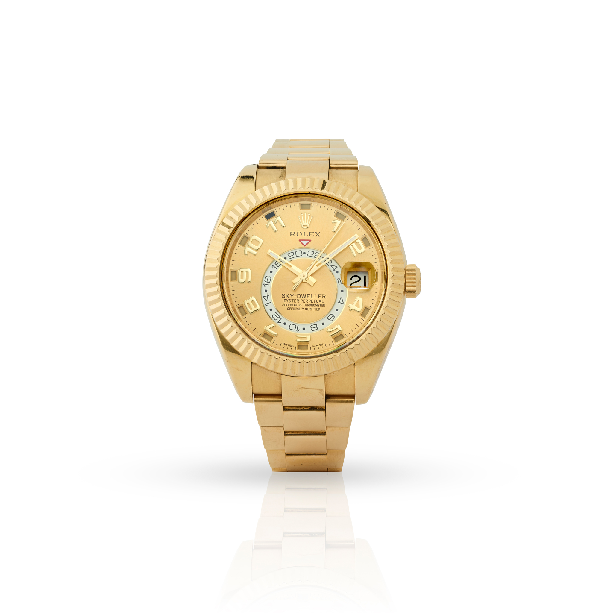 Rolex. A fine and unusual 18k yellow gold dual time zone automatic annual calendar wristwatch