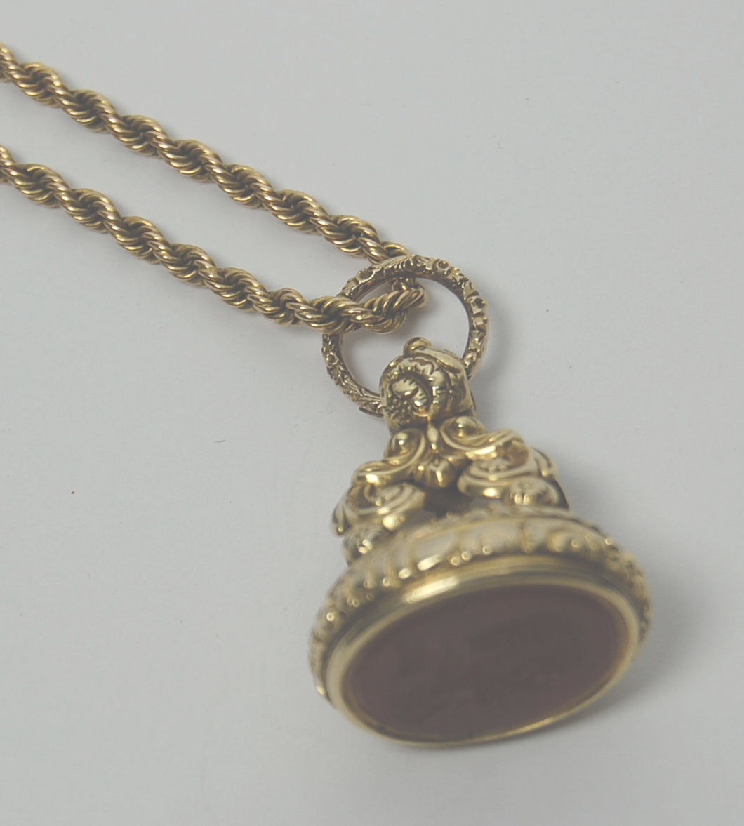 A Victorian gold long chain,