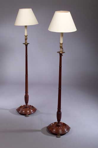A pair of 19th century mahogany candlesticks