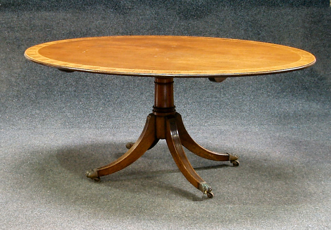A Regency style mahogany supper table
