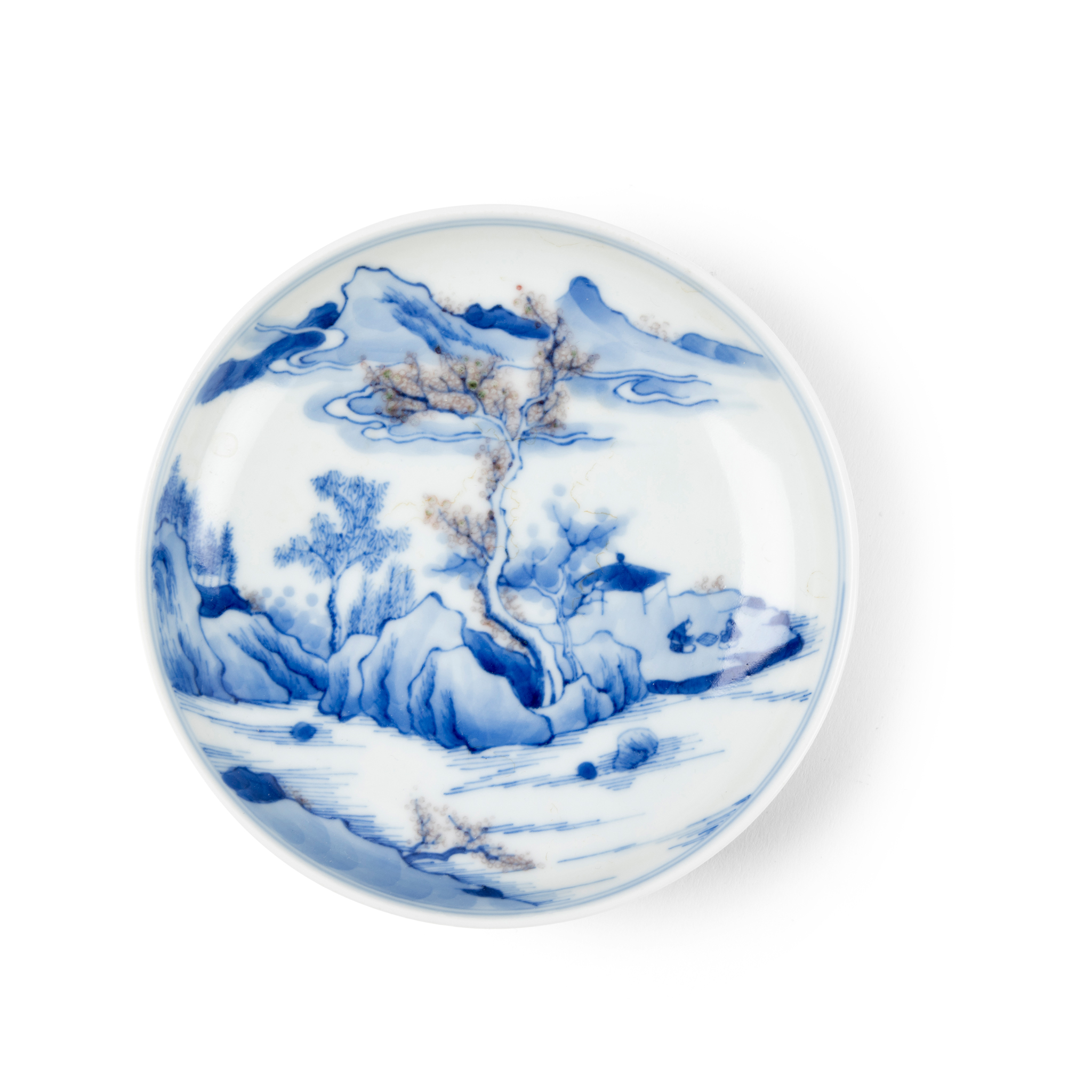 CHINESE BLUE AND WHITE WITH COPPER RED 'LANDSCAPE' SAUCER