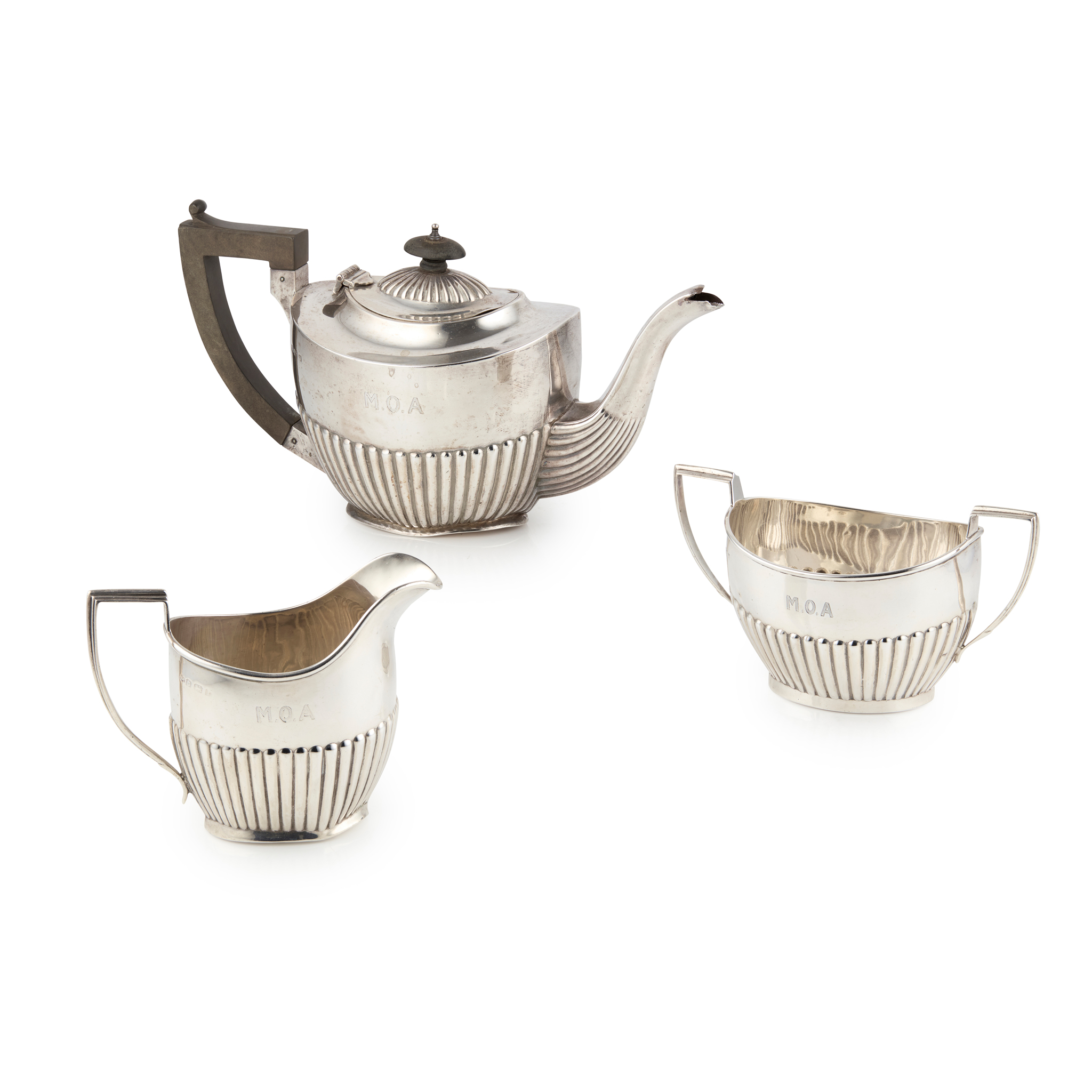 A MATCHED 1940s THREE PIECE TEA SERVICE