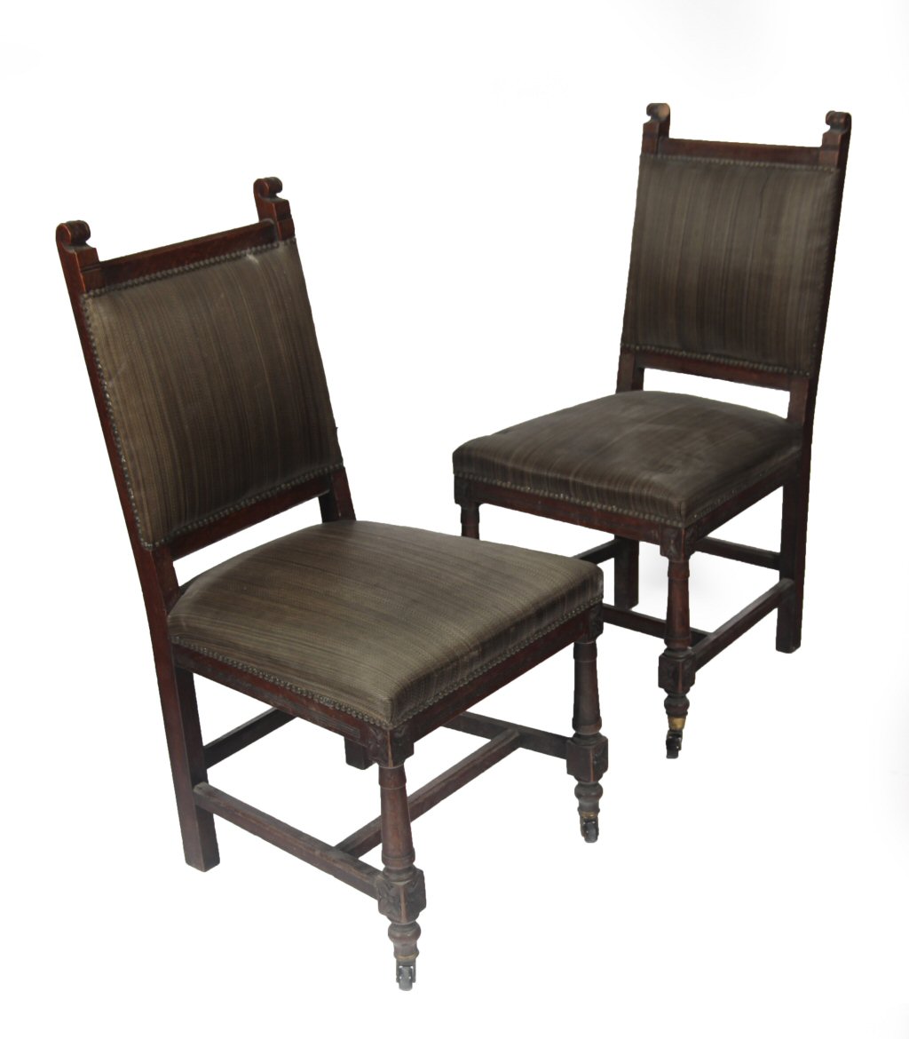 A set of six late 19th/ early 20th century oak dining chairs