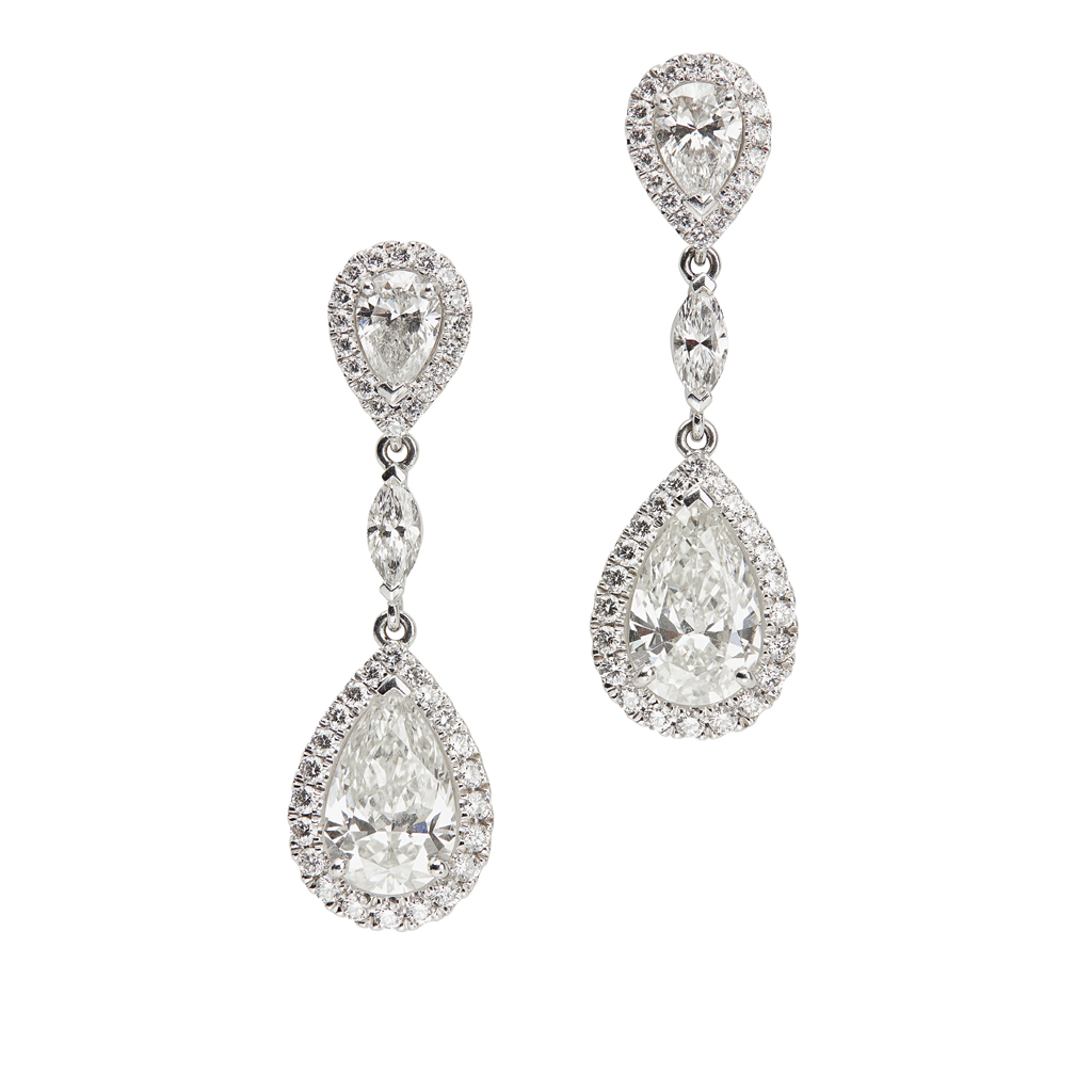 A pair of platinum and diamond set pendant earrings, De Beers