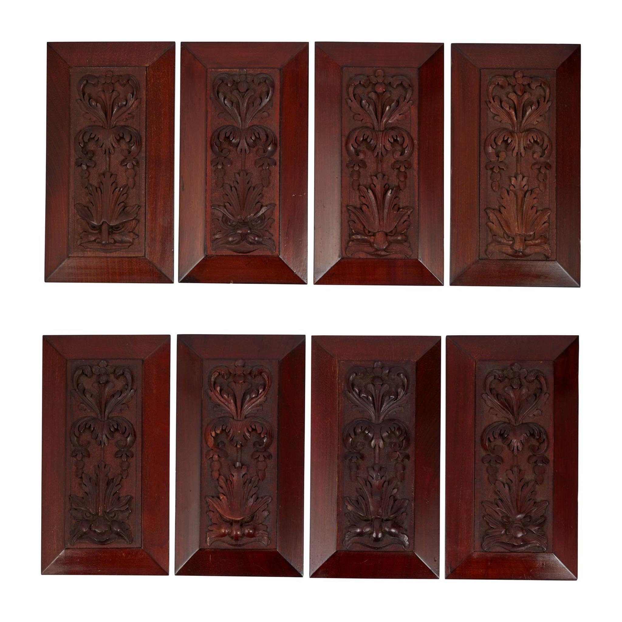 SET OF EIGHT CARVED MAHOGANY PANELS