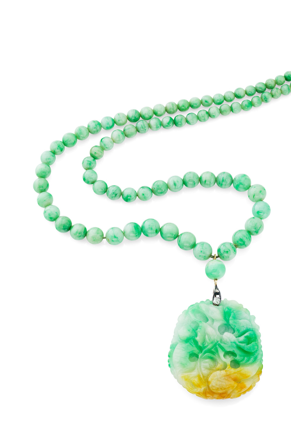 An early 20th century jadeite and diamond set necklace