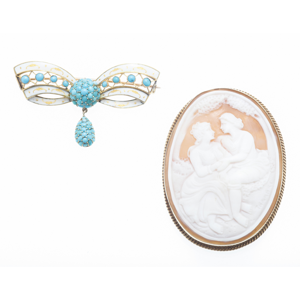 A turquoise and enamel set brooch