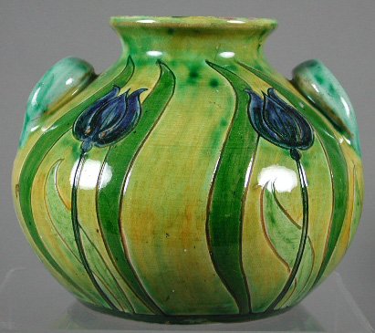 A Della Robbia twin handled ovoid vase