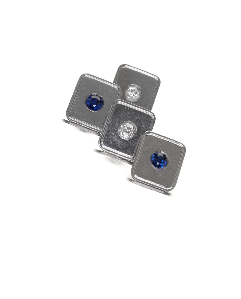A pair of platinum mounted sapphire and diamond set cufflinks