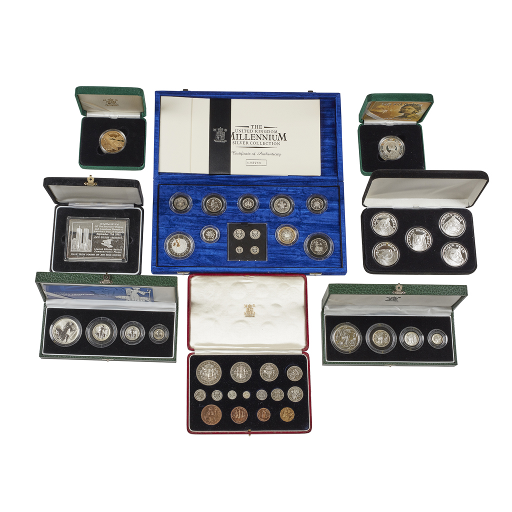 A collection of silver and other proof coins