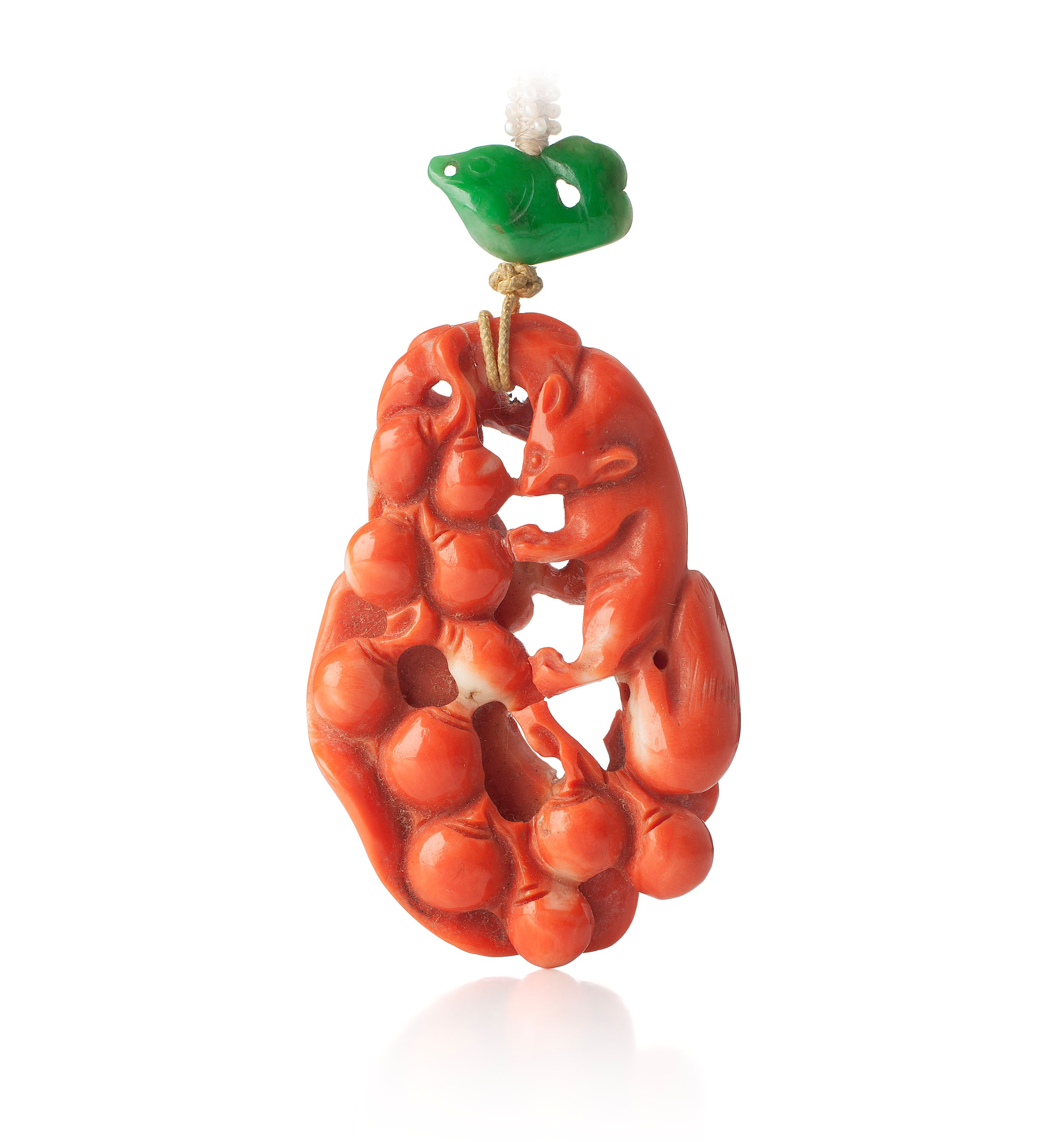 CHINESE CARVED CORAL PENDANT
